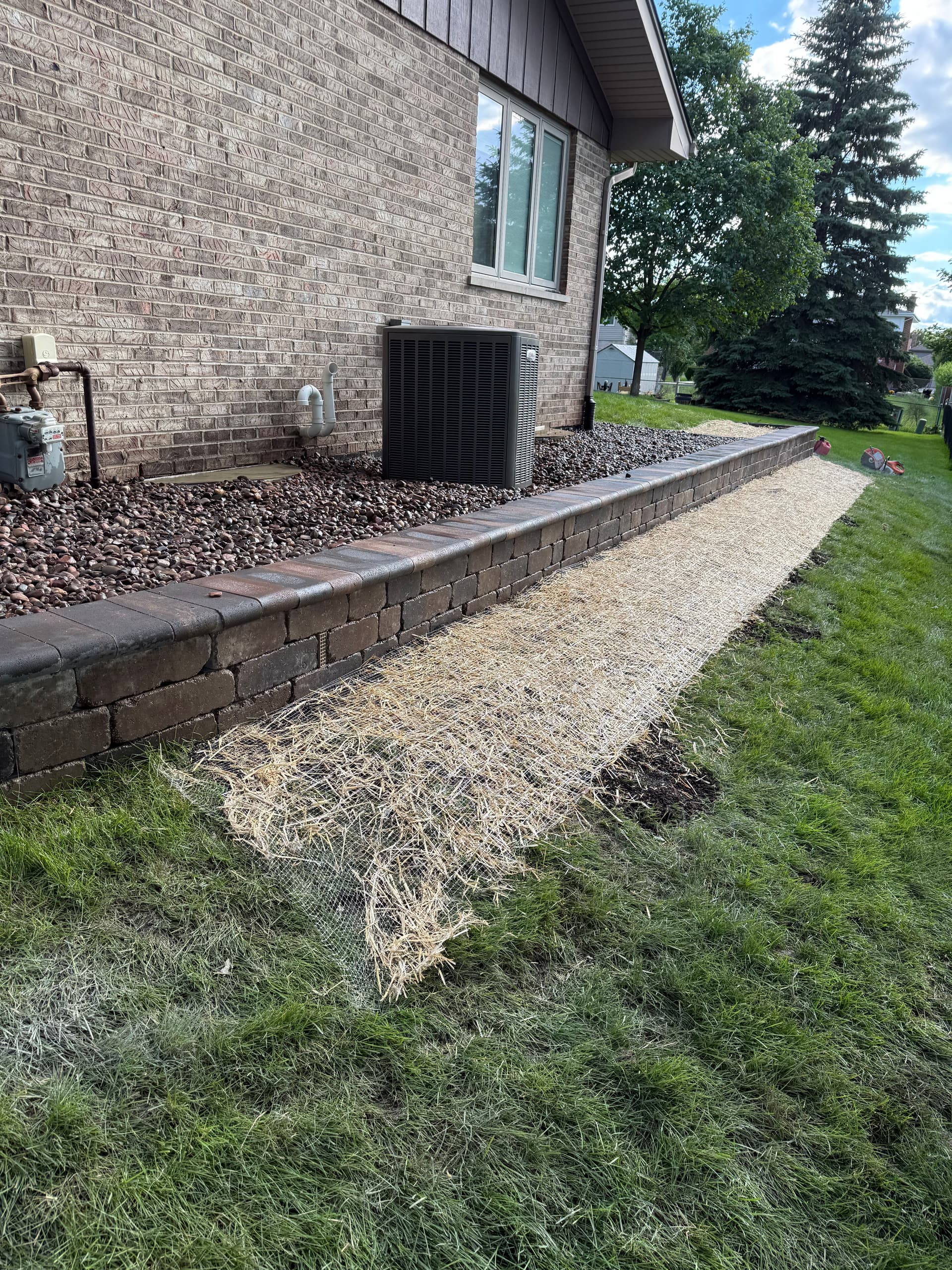 Retaining Wall Rebuild Fixes a Crumbling Side Yard in Frankfort image
