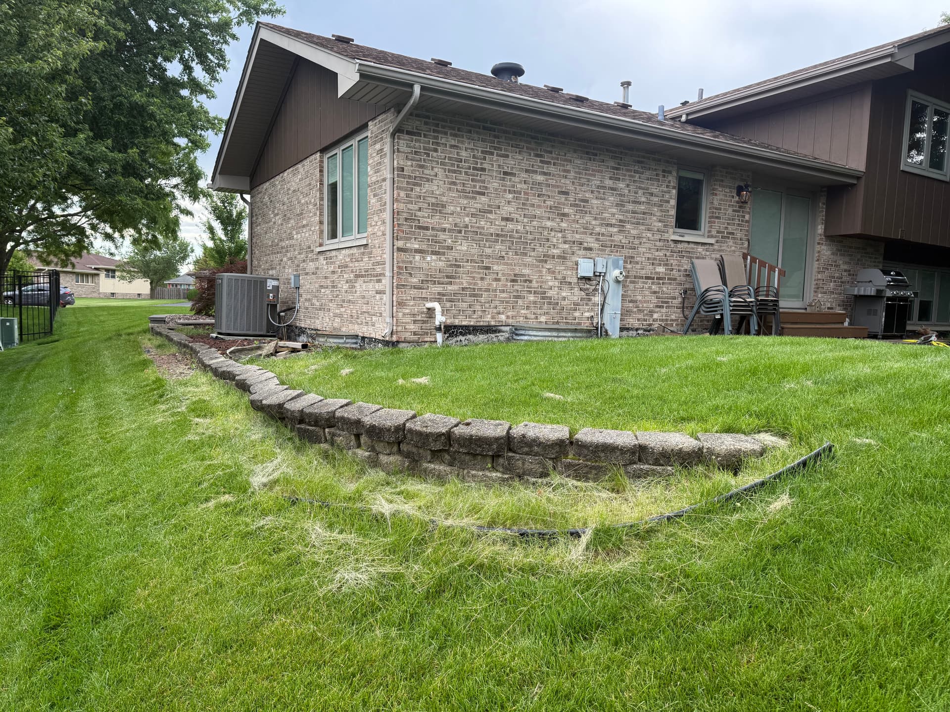 Gallery photos for Retaining Wall Rebuild Fixes a Crumbling Side Yard in Frankfort: Image #2
